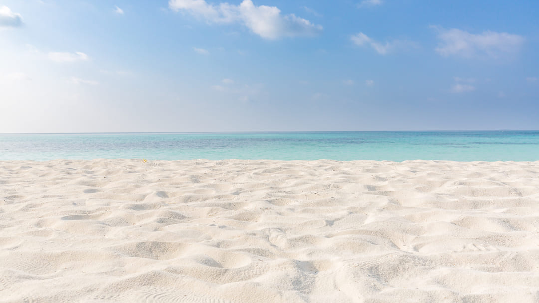 Come si forma la sabbia del mare?